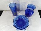 Blue Glass Vases and Bowl. Three blue glass items, including two vases and one bowl. The tall Image - 1