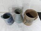 Three Pieces of Handmade Pottery. Three handmade pottery pieces, including a gray-blue mug with Image - 1
