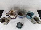 Pottery Items. Six ceramic pottery items including mugs, a small handled pitcher, a lidded Image - 1