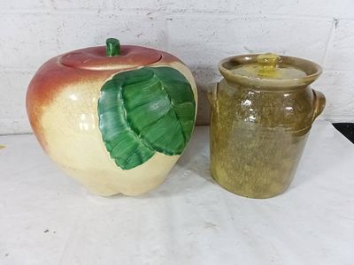 Two Ceramic Lidded Pottery Containers. Ceramic lidded pottery containers. The first is an 