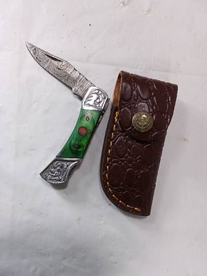 Damascus Folding Locking Blade Knife with Sheath. Damascus steel folding knife featuring a 