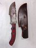 Damascus Bowie Knife with Leather Sheath. Damascus Bowie knife featuring a distinct patterned Image - 1