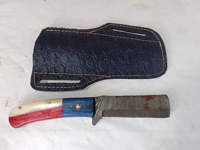 Damascus Steel Knife with Handle and Sheath. Damascus steel knife featuring a straight-edged 