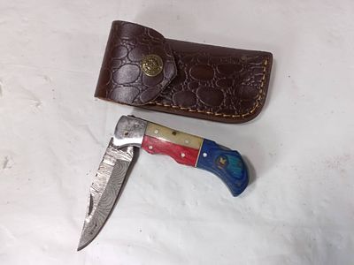 Damascus Folding Locking Blade Knife with Sheath. Folding locking blade knife featuring a 
