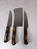 3 Damascus Butcher Knives with Swirled Handles. Three butcher knives crafted with Damascus steel Image - 1
