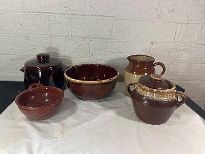 Five Ceramic and Stoneware Vessels. Five ceramic and stoneware vessels, including a West Bend 