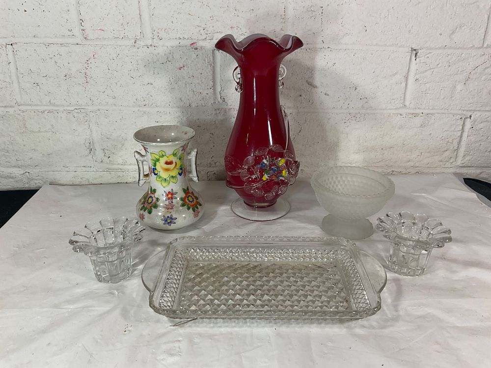 Glass and Ceramic Decorative Tableware. Collection includes a red, ruffled glass vase with 