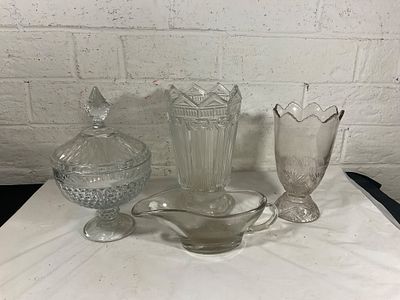 Decorative Glass Tableware. Four decorative glass items, including a lidded pedestal candy dish 