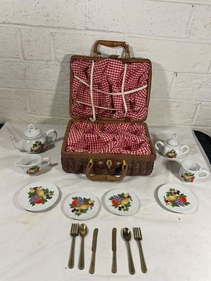 Wicker Picnic Basket With Ceramic Tea Set. Wicker picnic basket with snap closure and 