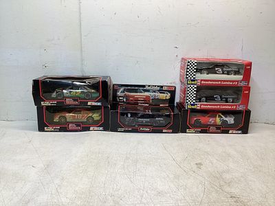 7 Revell 1:24 Die-Cast NASCAR Models. Seven Revell 1:24 scale die-cast NASCAR car models 