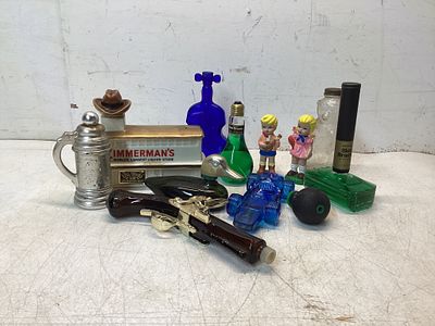 Novelty Glass and Ceramic Decanters. Lot featuring novelty glass and ceramic decanters and 