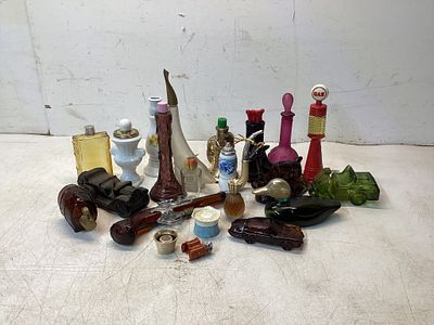 Avon Bottle Figurines and Decanters. A diverse collection of 22 Avon bottles and figurines 