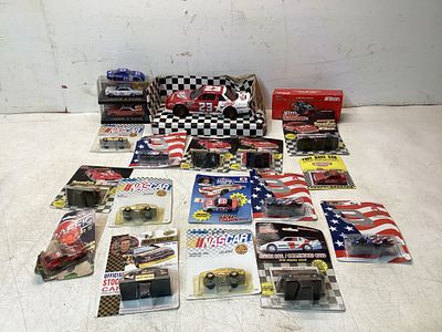 20 NASCAR Die-Cast Cars and Accessories. 20 NASCAR-themed die-cast cars and accessories. 
