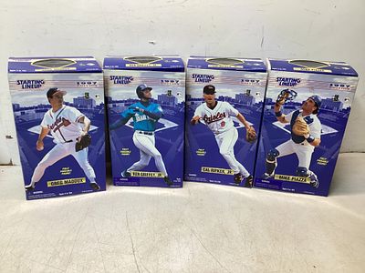 4Â 1997 Starting Lineup Action Figures. Four 1997 Starting Lineup sports action figures 