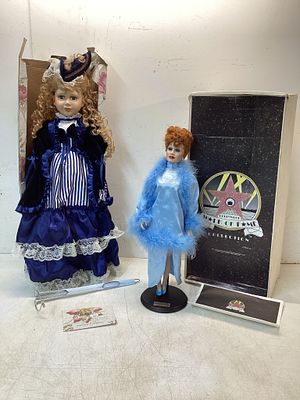 Two Collectible Dolls with Certificates. Two collectible dolls, each accompanied by a 