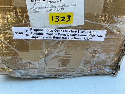 Portable Propane Forge with Hose and Regulator. Portable propane forge with an open structure 