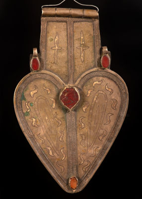 An impressive cordiform silver Asyk Pendant, Turkestan, Teke Tribe - 1880-1900. Worn originally 