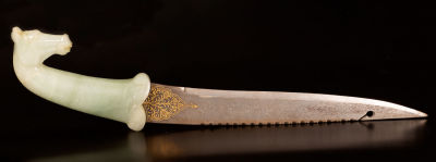 Moghul style gold inlay dagger with a jade hilt. The blade of the dagger is forged from Damascus 