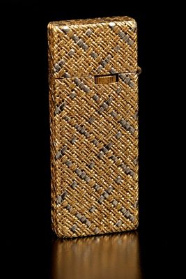 An 18K Yellow and White Gold Lighter. Vintage lighter with woven yellow and white gold case. 