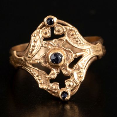 Gold ring, 14 karat, set with sapphires. Stylish ring made of 14 karat rose gold (stamped), set 