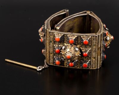 ethnic bracelet, golden silver combined with corals & pearls. an antique bracelet that is 