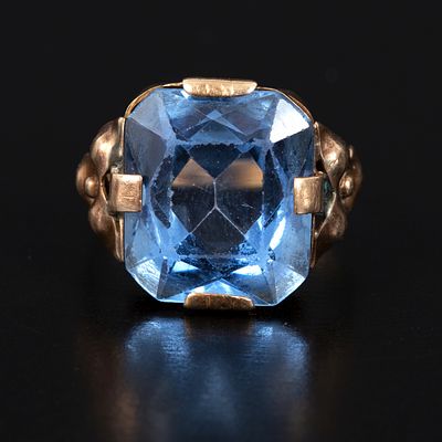 Vintage 14K Yellow Gold and Gemstone Ring. containing one octagonal modified brilliant cut blue 