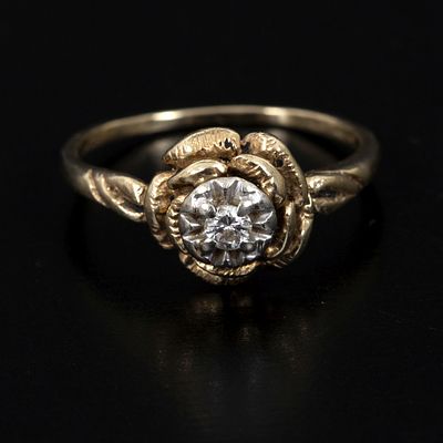 Antique 14K Gold and Diamond Flower Ring. in a stylized rose design containing one round 
