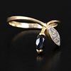 14K Gold, Sapphire and Diamond Ring. a lovely ring containing one marquise shape mixed cut Image - 2