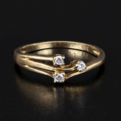 14K Yellow Gold and Diamond Ring. a fun ring that could be worn as a stacking ring, containing 