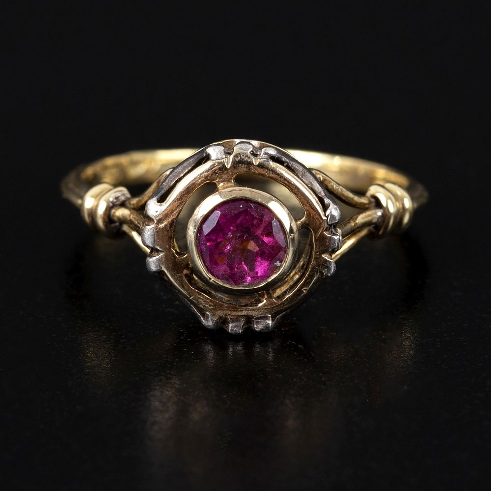 Vintage 14K Gold and Rubellite Tourmaline Ring. containing one round modified brilliant cut 