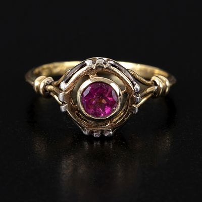 Vintage 14K Gold and Rubellite Tourmaline Ring. containing one round modified brilliant cut 