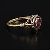 Vintage 14K Gold and Rubellite Tourmaline Ring. containing one round modified brilliant cut Image - 1