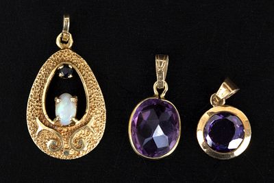 A Lot of Yellow Gold and Gemstone Pendants. three pendants total, the first is in 14K and 