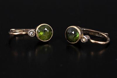 Victorian 14K Gold, Silver, Peridot and Diamond Earrings. containing two round modified 
