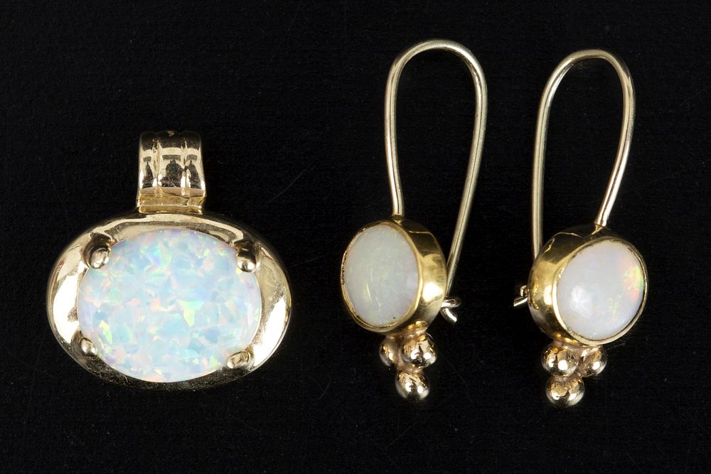 A Collection of 14K Yellow Gold and Opal Jewelry. consisting of one pair of earrings containing 