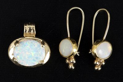 A Collection of 14K Yellow Gold and Opal Jewelry. consisting of one pair of earrings containing 