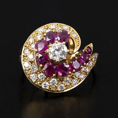 Lovely 18K Yellow Gold, Diamond and Ruby Ring. crafted in a lovely swirl design, containing 30 