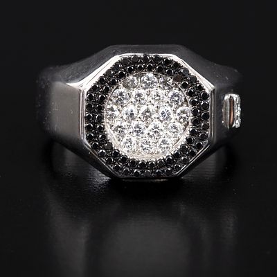 18K White Gold, Diamond and Black Diamond Ring. containing 22 round brilliant cut diamonds 
