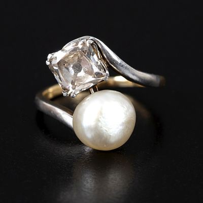 Antique 18K Diamond and Natural Pearl Ring. a lovely antique ring crafted in a bypass design 