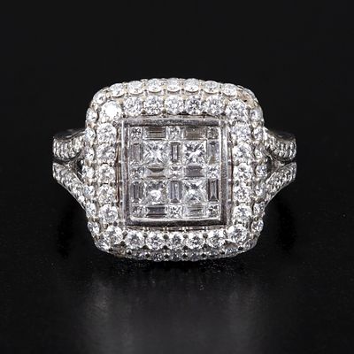 18K White Gold and 2.7 Carat Diamond Ring. containing numerous princess, baguette and round 