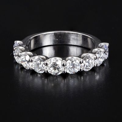 14K White Gold and 2.85 Carat Diamond Ring. semi-eternity band ring, containing nine round 