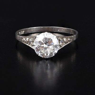Art Deco 18K Gold, Platinum and Diamond Ring. a lovely handmade ring, containing one old 