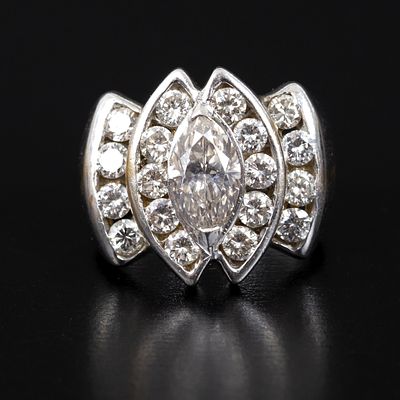 14K White Gold and 3.05 ct Diamond Ring. containing one marquise shape brilliant cut diamond 