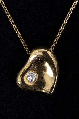 Peretti for Tiffany & Co 18K Gold and Diamond Necklace. a classic heart shape slide pendant by 