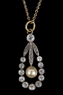 Antique Platinum, Gold, Diamond and Pearl Necklace. consisting of a 3 cm 18K gold and platinum 
