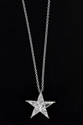 Italian 18K White Gold and Diamond Star Necklace. finely crafted 18K gold slide pendant 