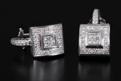 18K White Gold, 1.5 Carat Diamond Earrings. halo style earclips, containing 66 round brilliant 