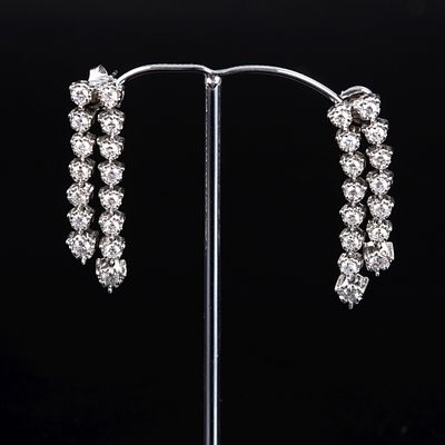 14K White Gold and 3.0 Carat Diamond Earrings. crafted in an elegant dangling style, containing 