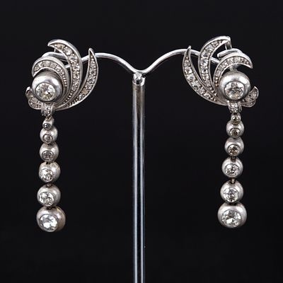 Art Deco 14K Gold and 3.5 Carat Diamond Earrings. a lovely antique pair of earrings with 