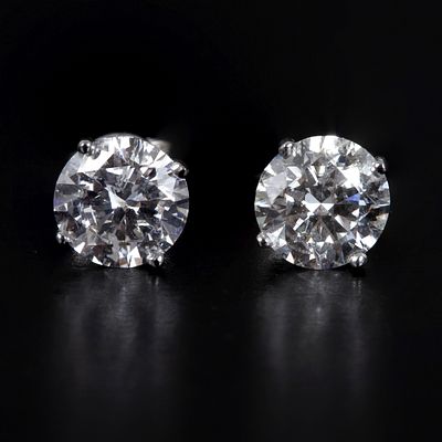 14K White Gold, 2 Carat Diamond Stud Earrings. very well matched pair of stud earrings 